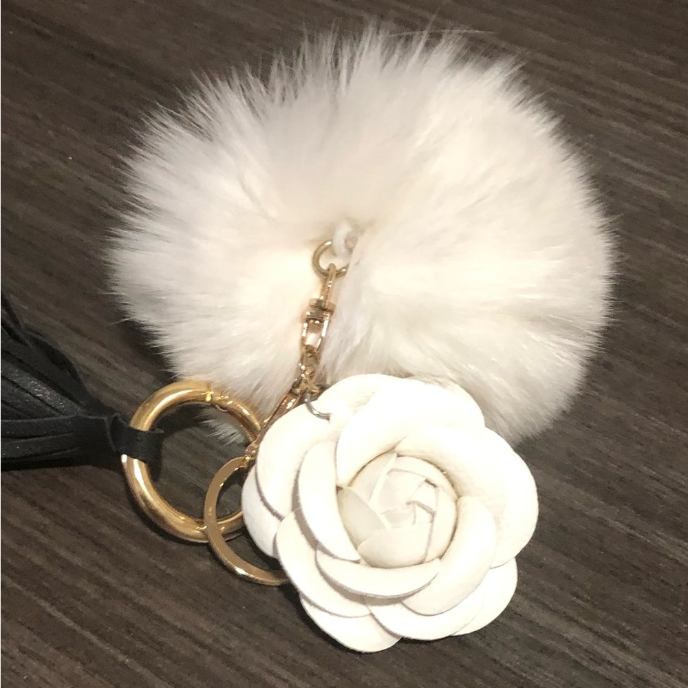 Keychain: replica of the Chanel Camellia flower w white pom pom